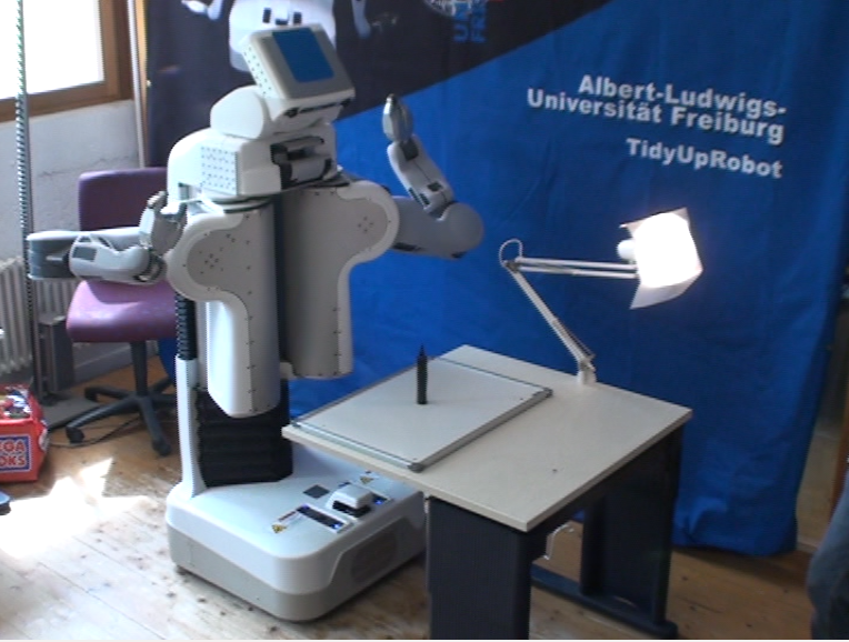 prepare the pr2: the pen is in front of the pr2 and in range of his hand